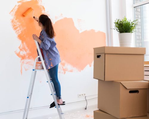 cheerful-woman-painting